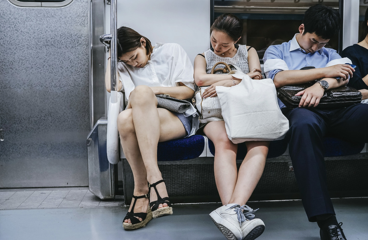 Schlafende in der U-Bahn. Foto: Jun Michael Park